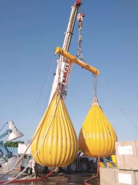 Crane proof-load test using two yellow water bags